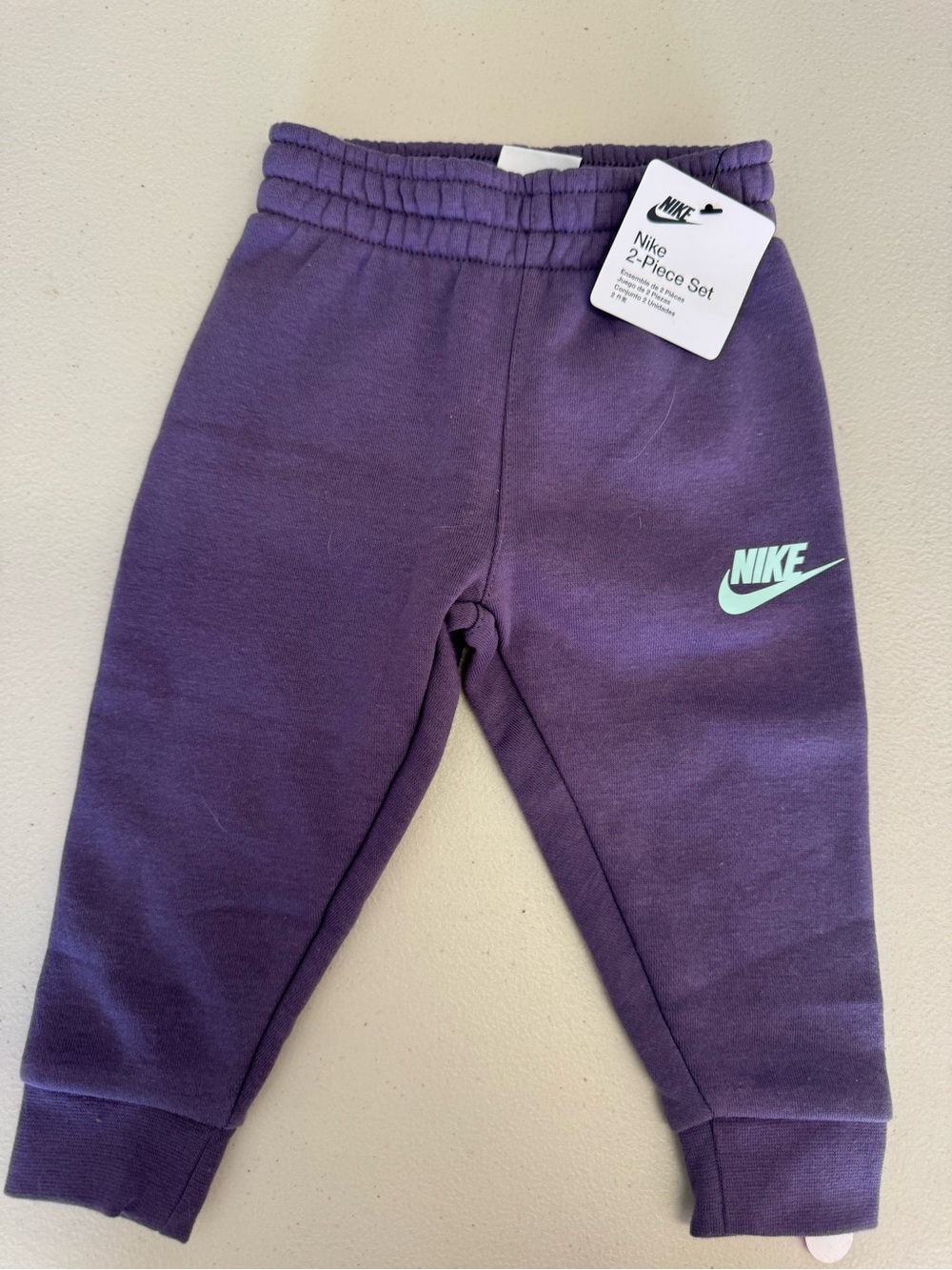 Nike Kids Purple Joggers with Mint Swoosh